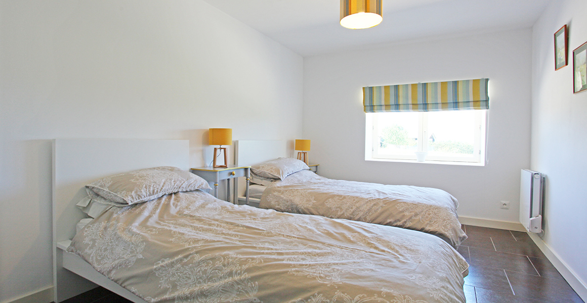 The ground floor wing twin en suite bedroom