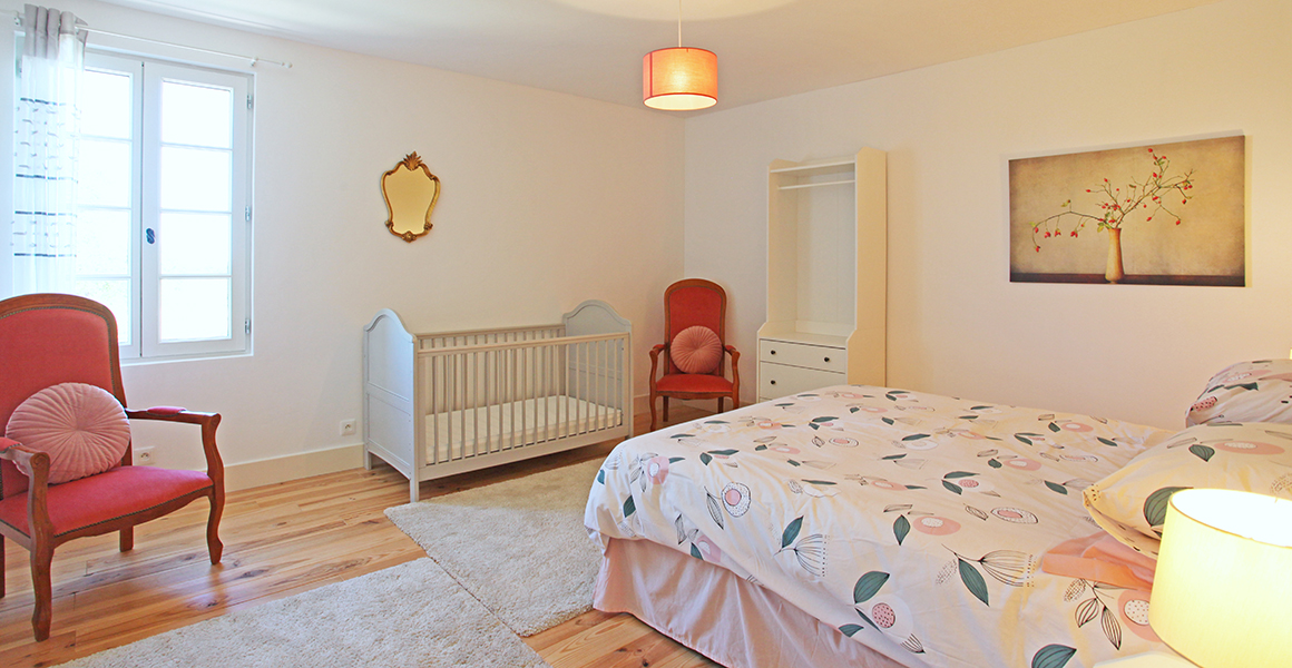 The main house first floor bedroom with king-size bed