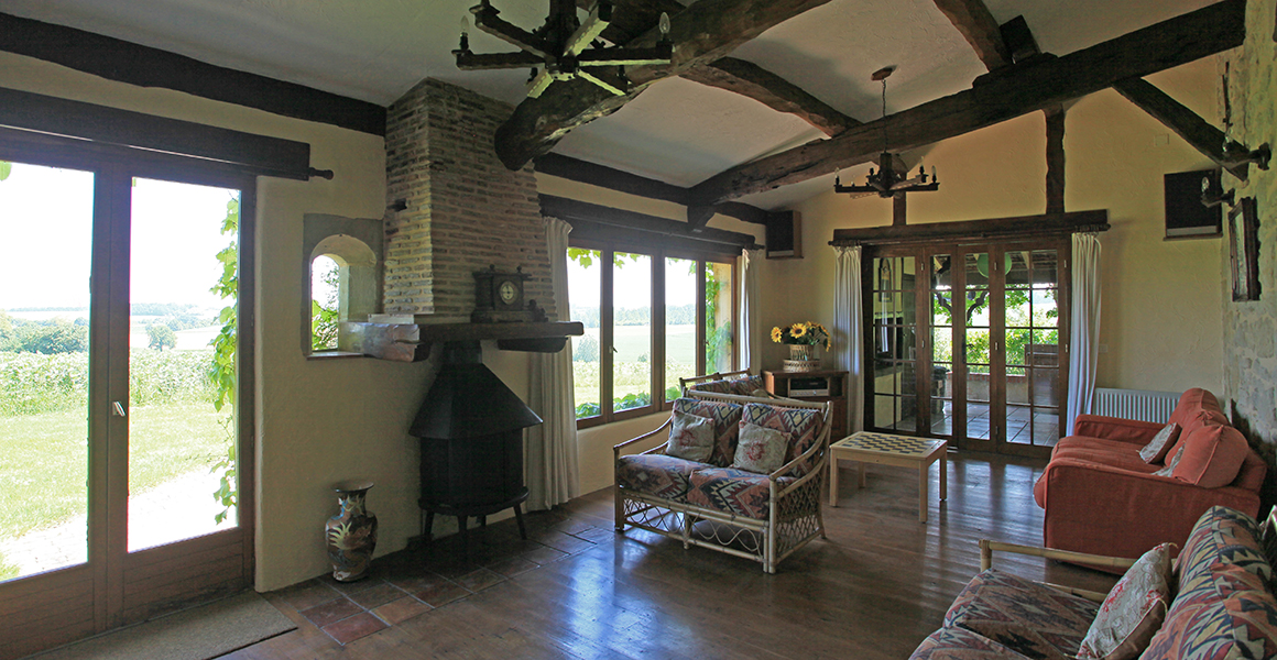 The sitting room leads to the covered terrace