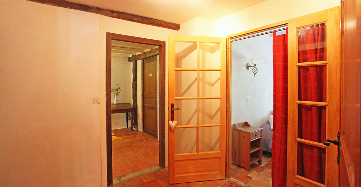 The reading area leads to the accessible double bedroom, WC and bath/shower room