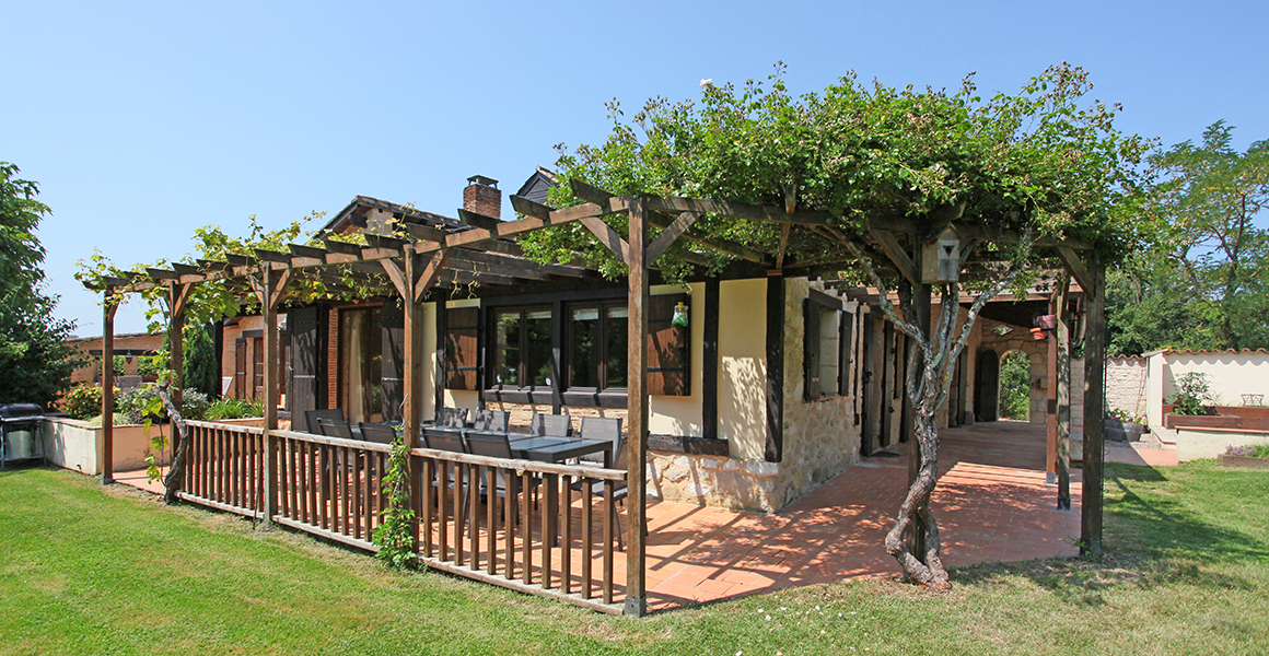 The terraces at the rear and side of the property