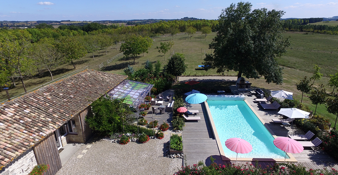 The pool and countryside beyond