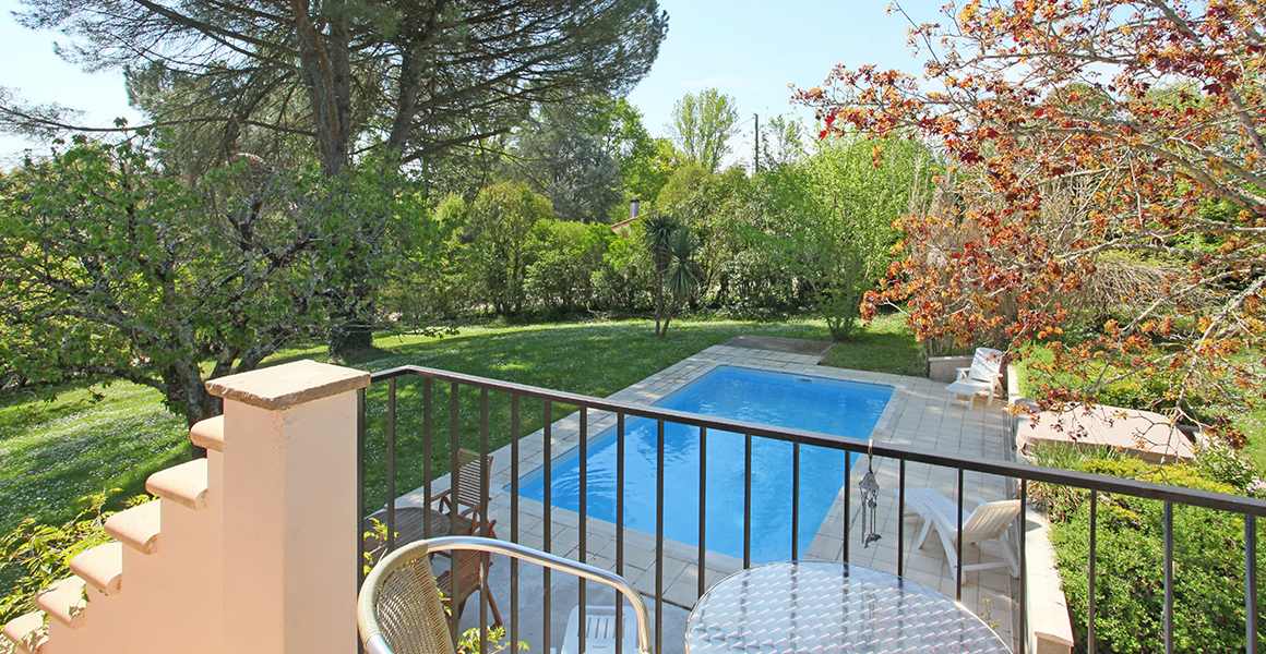 Bedroom 2 balcony overlooking pool