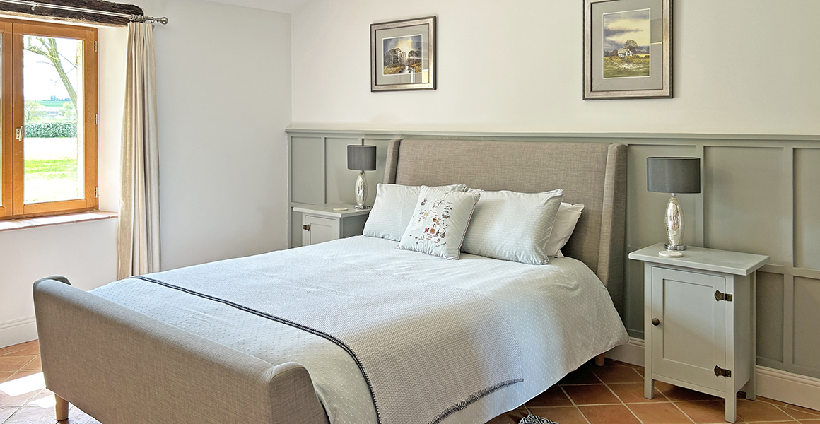 Bedroom with views across the gardens