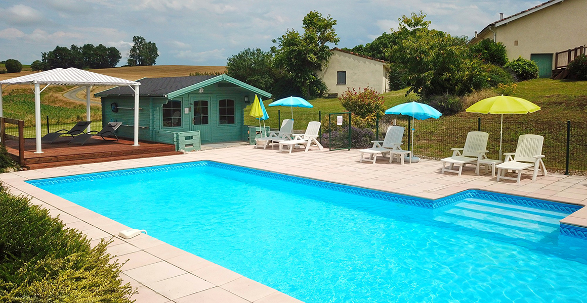 The lovely shared pool overlooking the countryside