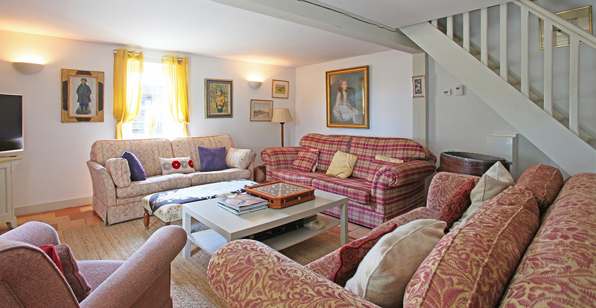 Large gite lounge with stairs to first floor