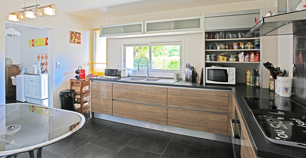 Kitchen with opening through to utility room