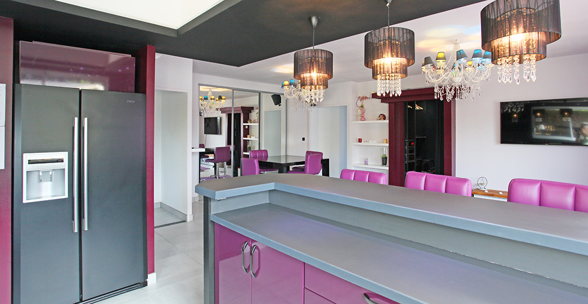 The kitchen looking towards the dining area and access to bedrooms