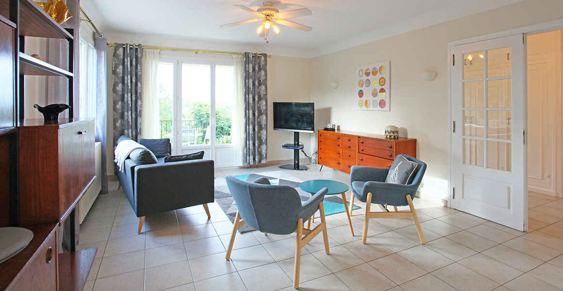 The lounge area looking towards the front of the house and entrance hall